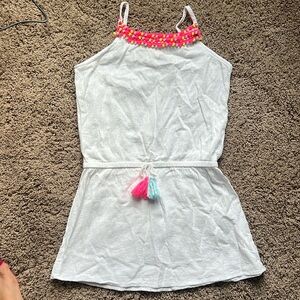 Girls cover up. Tassels and neon pom poms. Size 14